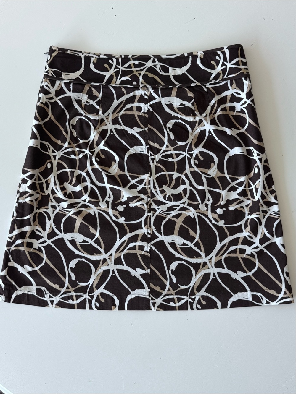 Suzy Shier Black Mini Skirt with White Ring Print